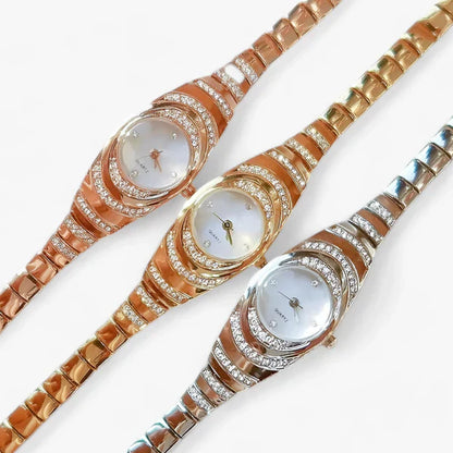 Women's oval quartz watch with crystal and diamond inlays